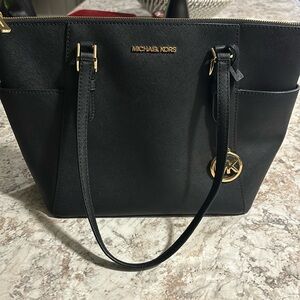Black MK tote with gold hardware